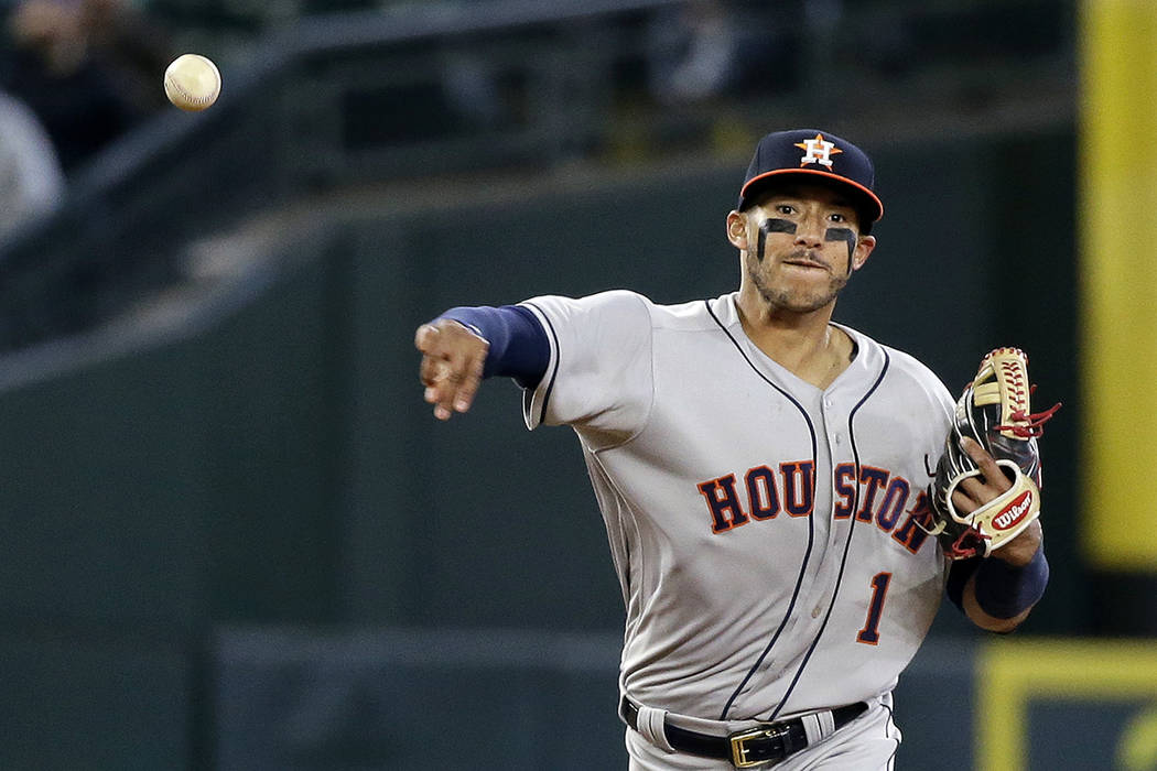 El torpedero de los Astros de Houston, Carlos Correa. | AP Foto/Elaine Thompson
