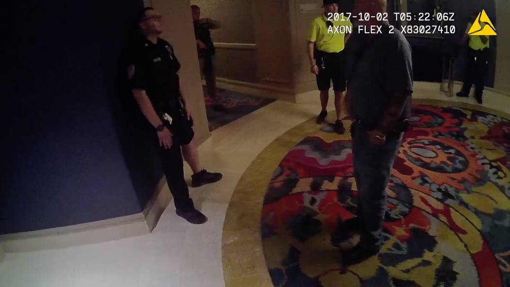 A frame grab from newly released footage of Jesus Campos, left, on the 32nd floor with other officers and security guards on the night of Oct. 1, 2017.