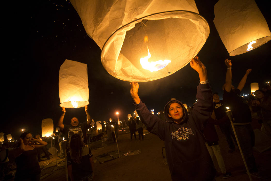 Abigail Arres, 11, of California releases a lantern during the RiSE Lantern Festival held at the Moapa River Indian Reservation on Friday, Oct. 6, 2017. Richard Brian Las Vegas Review-Journal @veg ...