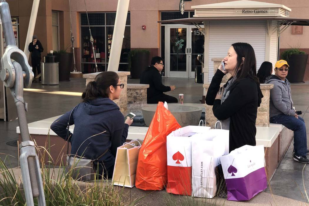 Black Friday shoppers take a break at the North Premium Outlet in downtown Las Vegas, Friday, Nov. 23, 2018. (Bizuayehu Tesfaye/Las Vegas Review-Journal) @bizutesfaye