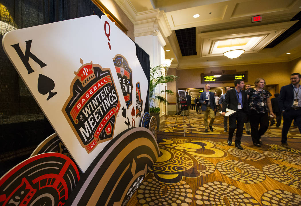 Attendees pass by during Major League Baseball's winter meetings at Mandalay Bay in Las Vegas on Monday, Dec. 10, 2018. Chase Stevens Las Vegas Review-Journal @csstevensphoto