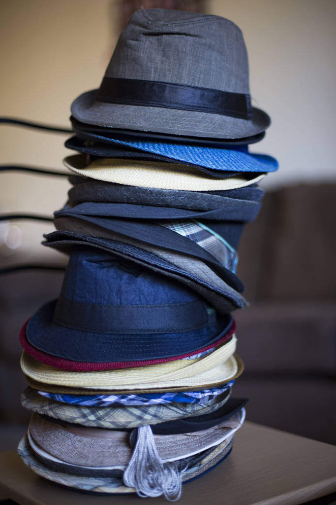 Los sombreros distintivos del comediante Brandon Cox Sanford en su casa en Henderson, el martes 19 de febrero de 2019. Cox Sanford nació con el VIH y lo menciona en sus sets de pie para remover e ...