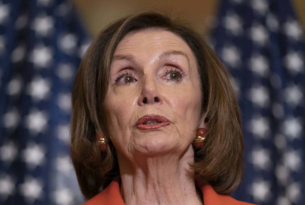 In a June 21, 2019, photo, House Speaker Nancy Pelosi of Calif., speaks with reporters at the C ...