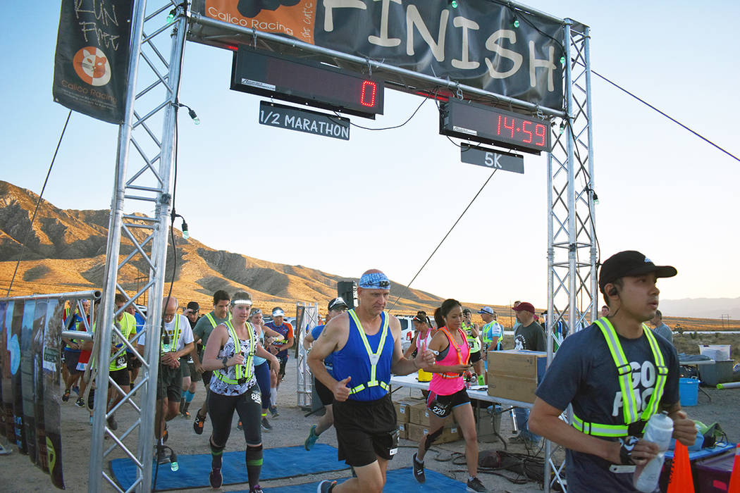 La categoría del medio maratón fue dominada por Norman Kim (800), de Westford, Massachusetts, ...