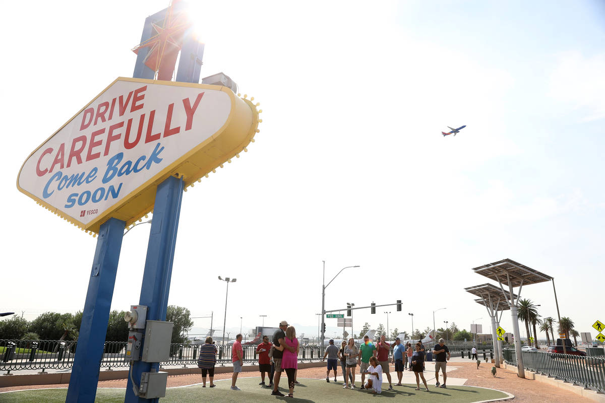 People take photos at the Welcome to Fabulous Las Vegas Sign in Las Vegas, Thursday, Sept. 17, ...