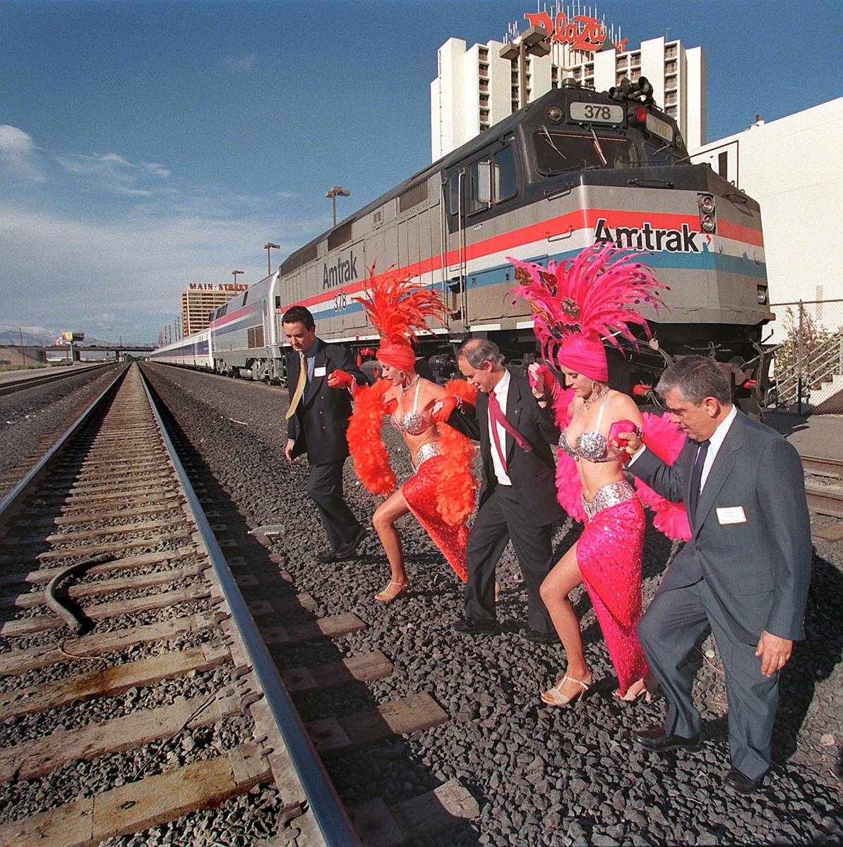 Los ejecutivos del tren Gustavo González, desde la izquierda, Gil Mallery y Lucas Oriol asiste ...