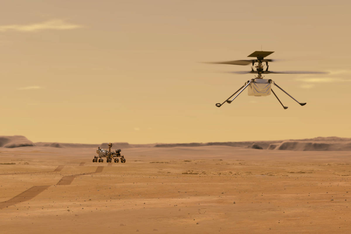 Esta ilustración facilitada por la NASA muestra el helicóptero Ingenuity en Marte tras su lan ...