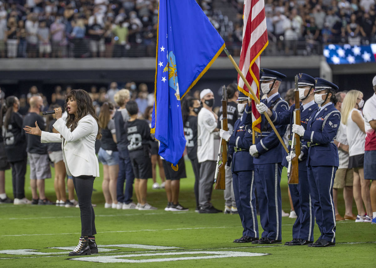 Marie Osmond sings the National anthem before the Raiders home opening pre-season NFL football ...