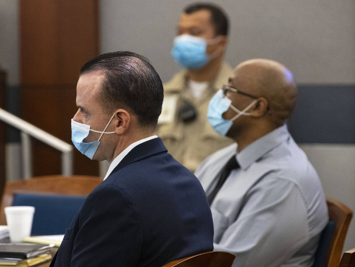 Michael Rusk, 28, left, and Cortrayer Zone, 38, appear in court during their murder trial at th ...