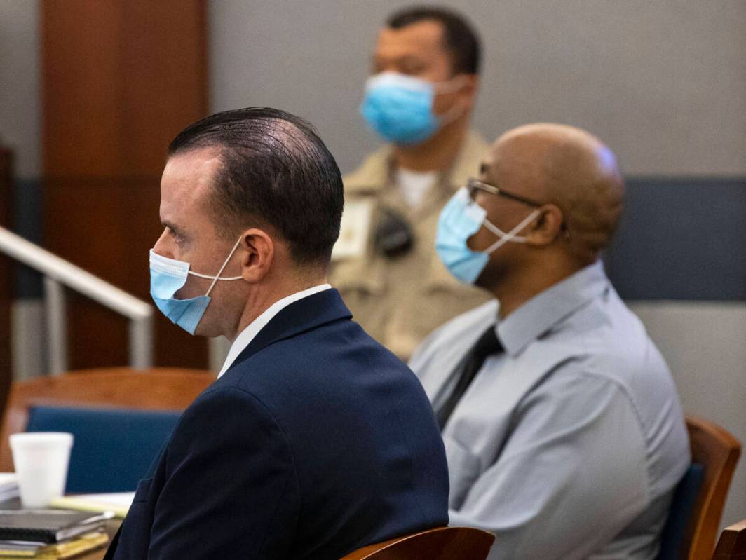 Michael Rusk, 28, left, and Cortrayer Zone, 38, appear in court during their murder trial at th ...