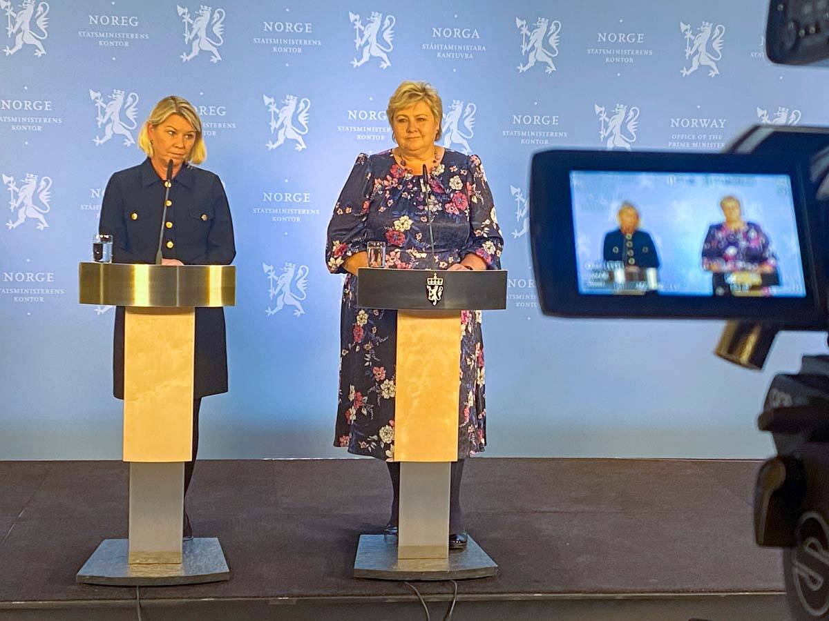 Norway's Acting Prime Minister Erna Solberg, right, and Minister of Justice Monica Mæland, lef ...