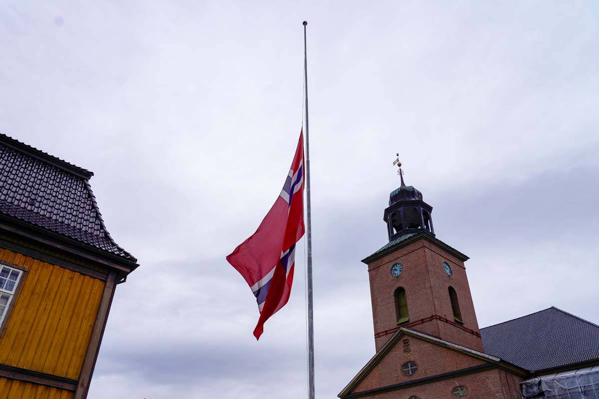 The Norwegian flag is at half-mast in Kongsberg the day after a man killed several people, in K ...