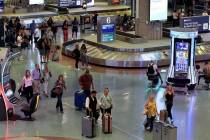 Pasajeros en el reclamo de equipaje en la Terminal 1 del Aeropuerto Internacional Harry Reid el ...