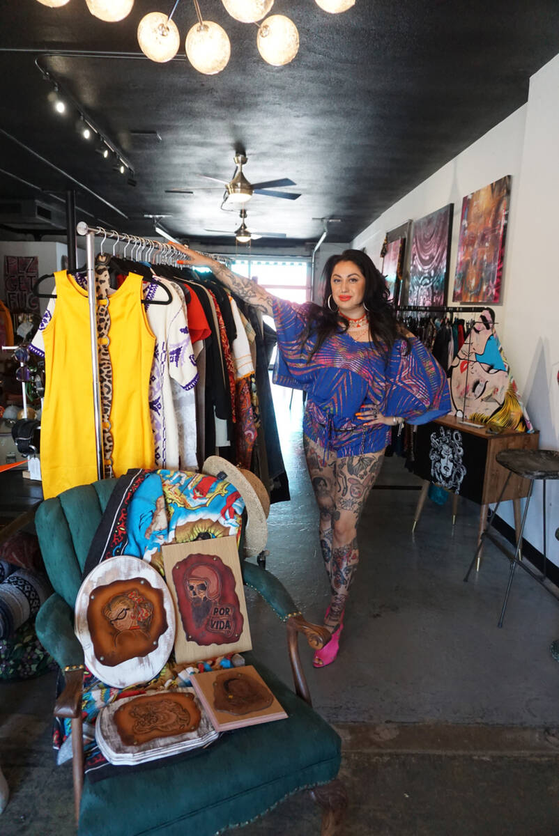 Ruby Romero posa junto a una colección de ropa vintage en Sin Amor Studio, en el Distrito de A ...