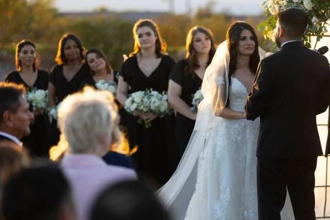 Brittany Castrejón, a la izquierda, se casa con su prometido, Jorge Gonzalez-Calvillo, durante ...