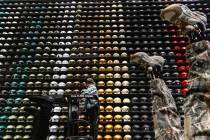 Una pared de gorras de 75 pies se muestra en Culture Kings en Forum Shops at Caesars, el lunes ...