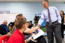 El gobernador Joe Lombardo da la mano a los estudiantes de Mountain View Christian School y sus ...