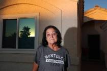 Royanne McNair, de 69 años, se encuentra para una foto afuera de su casa el sábado, 15 de jul ...