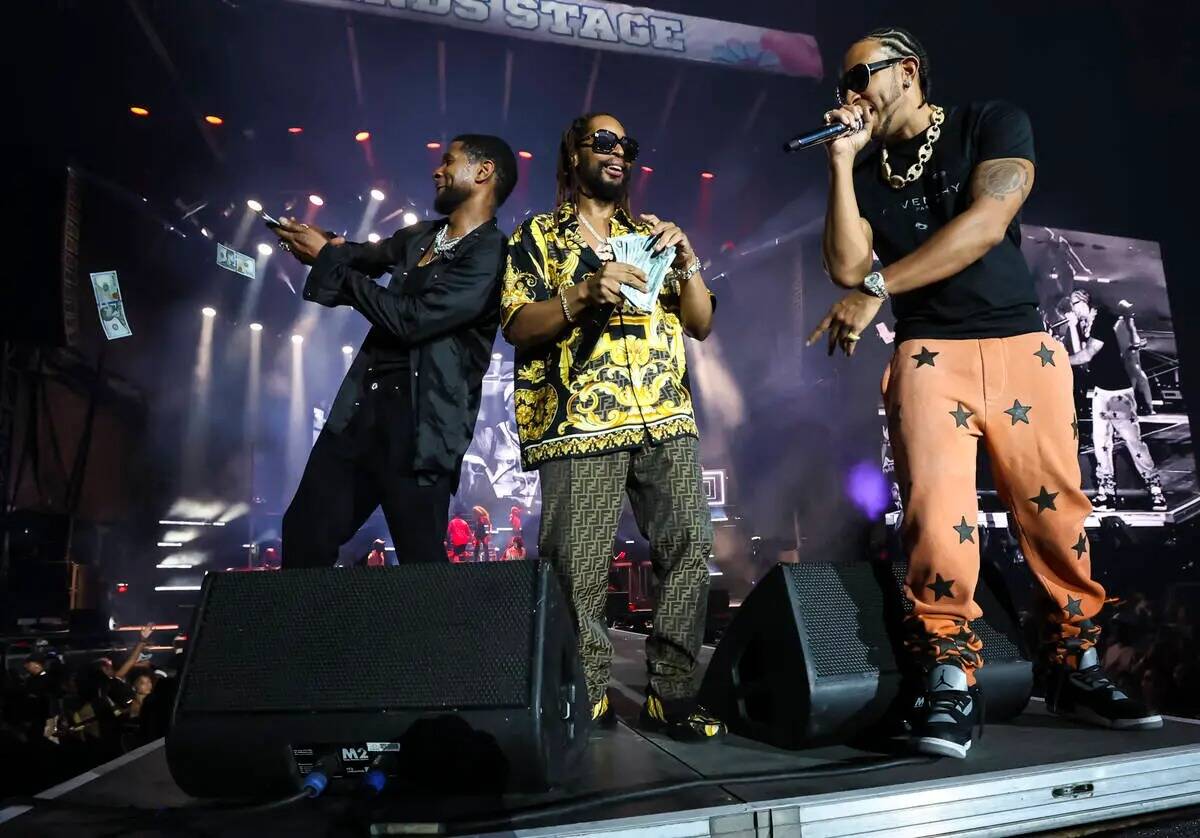 Usher, de izquierda a derecha, Lil Jon y Ludacris se presentan durante el festival de música L ...