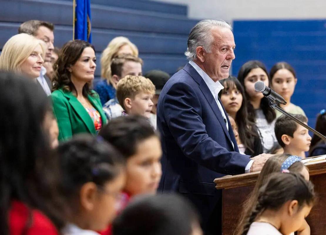 El gobernador Joe Lombardo habla durante un mitin de "elección de escuela" en Saint Anne Catho ...