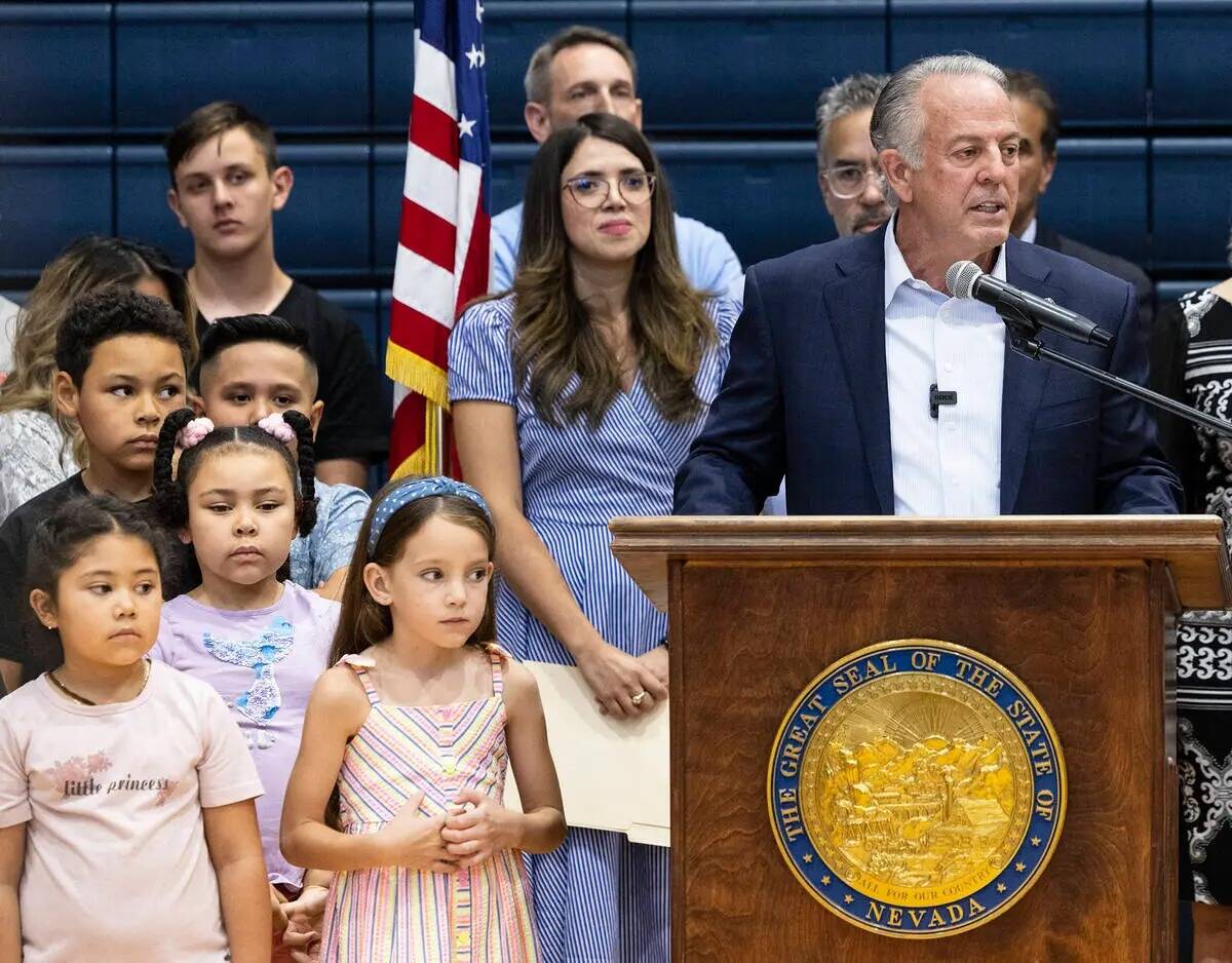 El gobernador Joe Lombardo habla durante un rally de "elección escolar" como Valeria Gurr, a l ...