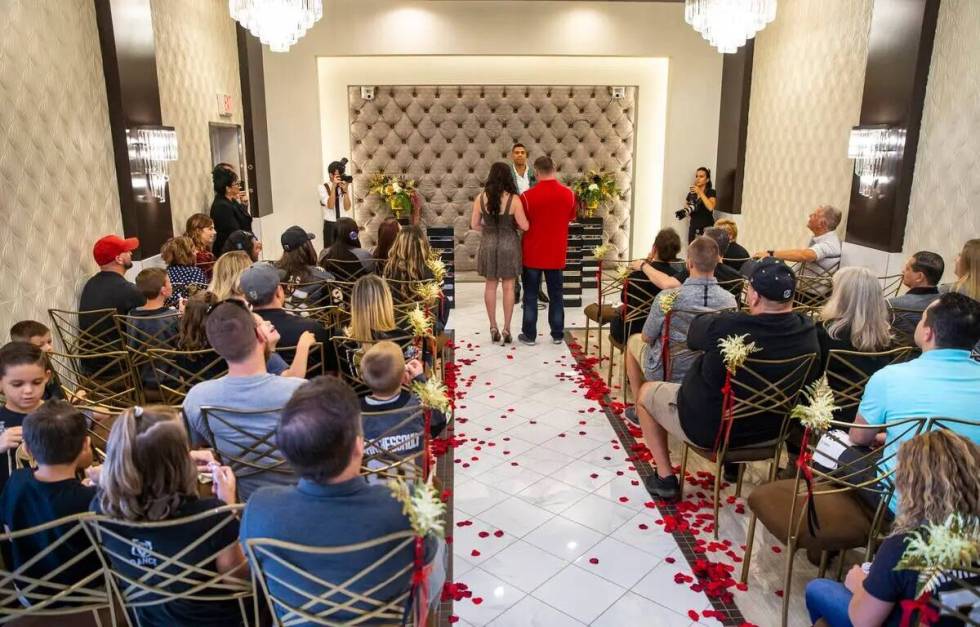 Vegas Golden Knights player Ryan Reeves leads a vow renewal ceremony...