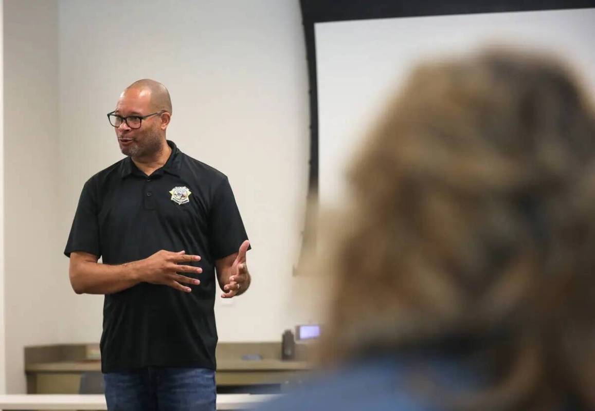 El fiscal general de Nevada Aaron Ford se dirige al público en una sesión de escucha destinad ...