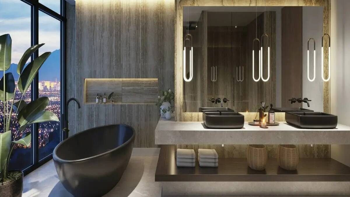 El cuarto de baño de una suite ejecutiva destaca la bañera de hidromasaje y el lavabo doble. ...