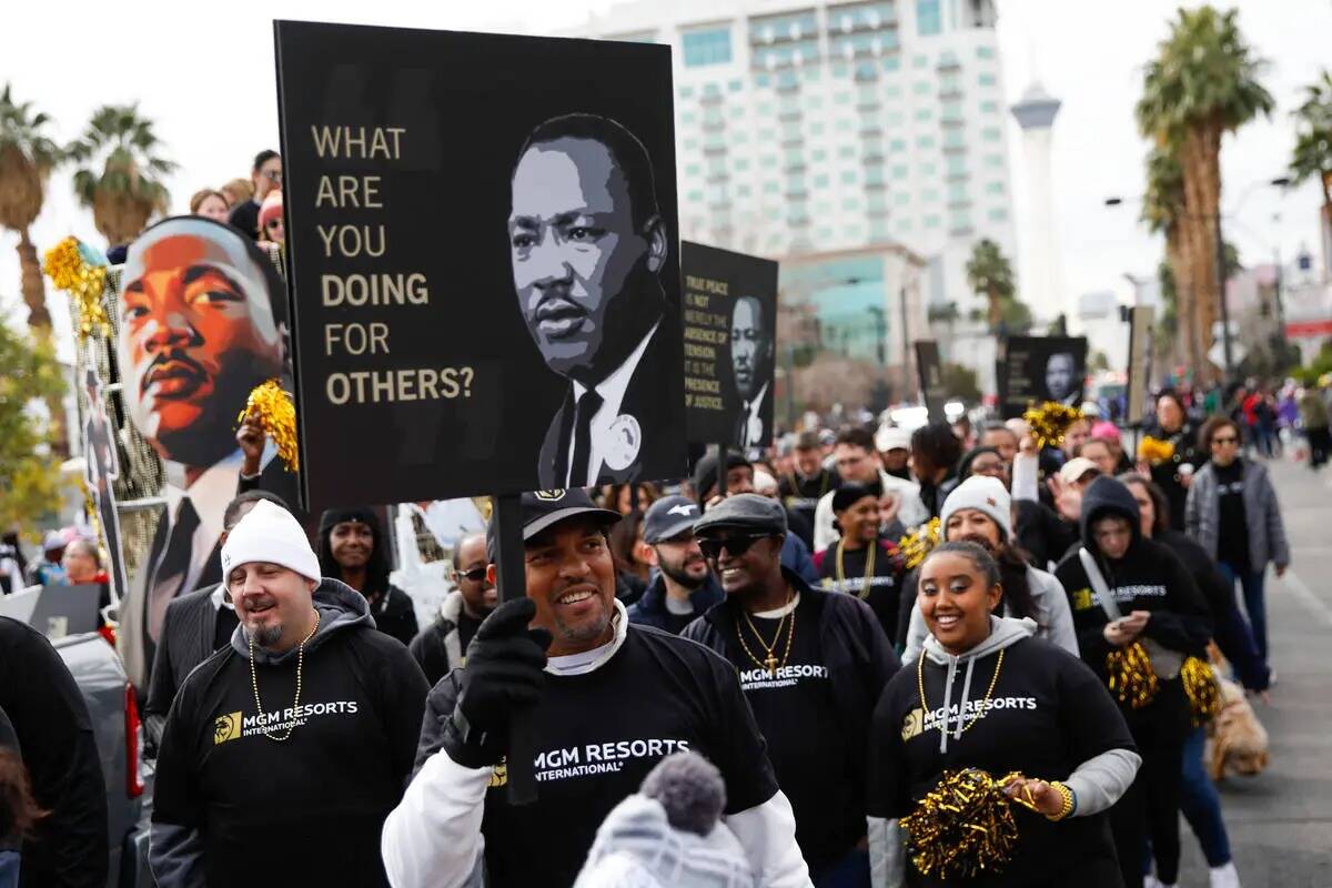 Empleados de MGM Resorts marchan en el desfile anual del Día de Martin Luther King Jr. el lune ...