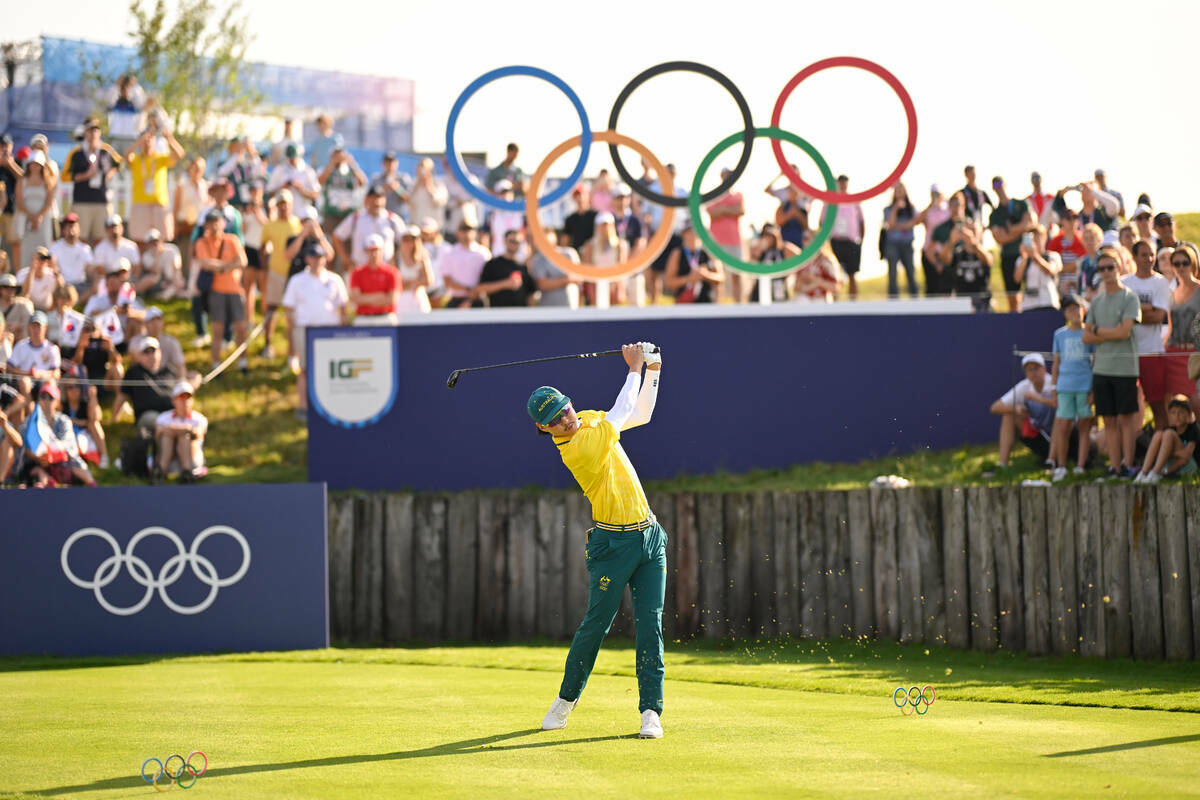 Min Woo Lee del Equipo de Australia sale en el primer hoyo durante la primera ronda de los Jueg ...