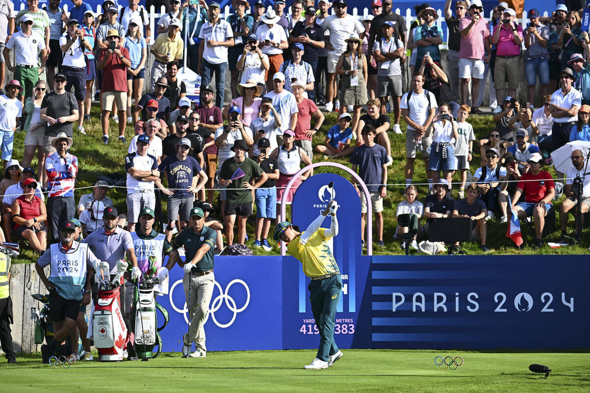 Min Woo Lee del Equipo de Australia sale en el primer hoyo durante la primera ronda de los Jueg ...