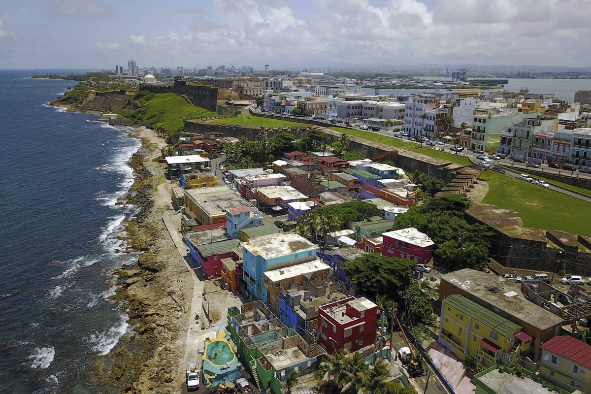 ARCHIVO - Vista aérea del barrio costero de La Perla, en San Juan, Puerto Rico, el 25 de agost ...