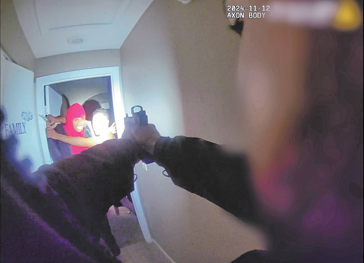 In a frame grab from a body-worn camera video provided by Metro, an intruder identified as Alej ...